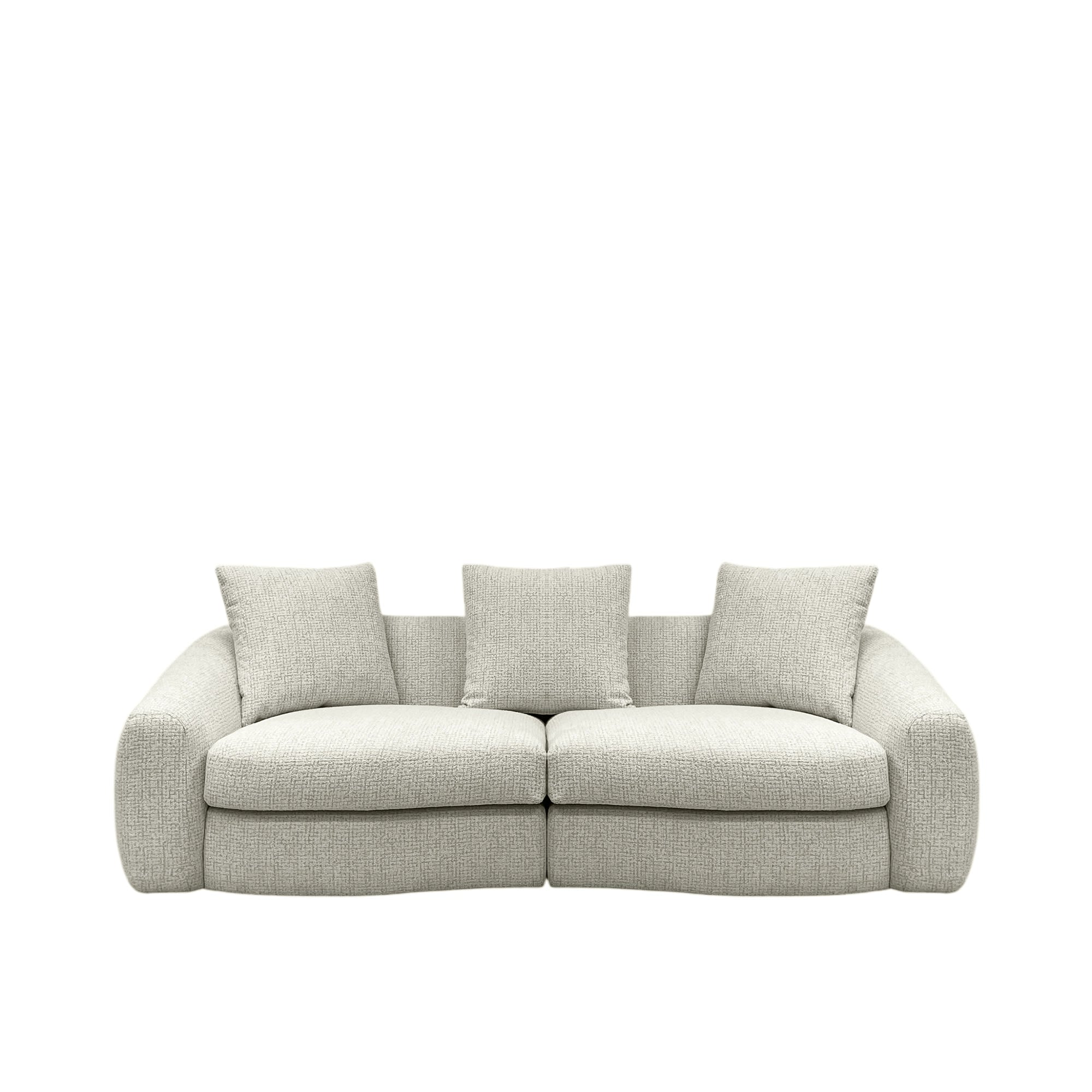 Beige sofa with three cushions on a white background