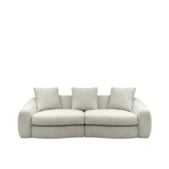 Beige sofa with three cushions on a white background